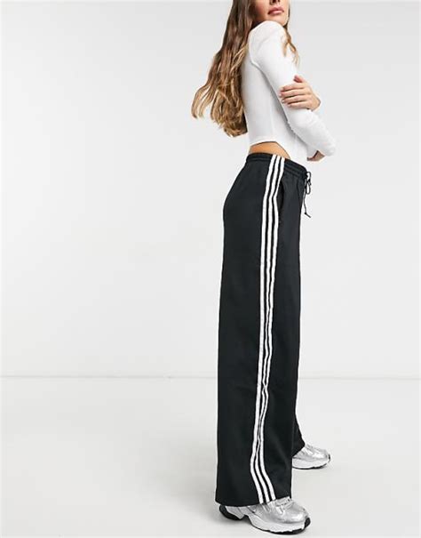 adidas broek zwart met rode strepen|Adidas sportbroeken retro.